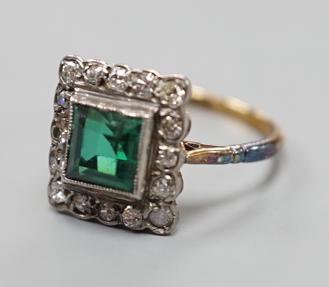 An 18ct gold, green paste? and diamond set square cluster ring, size L, gross weight 2.2 grams.